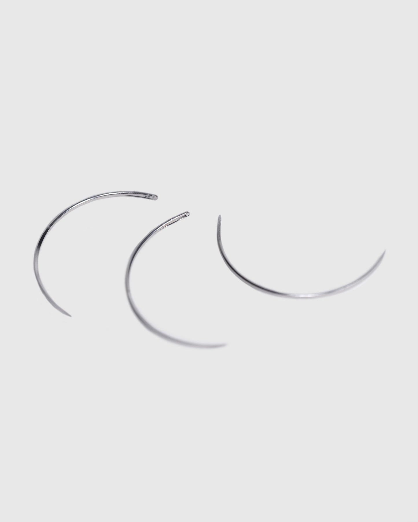 Aguja curva para extensiones